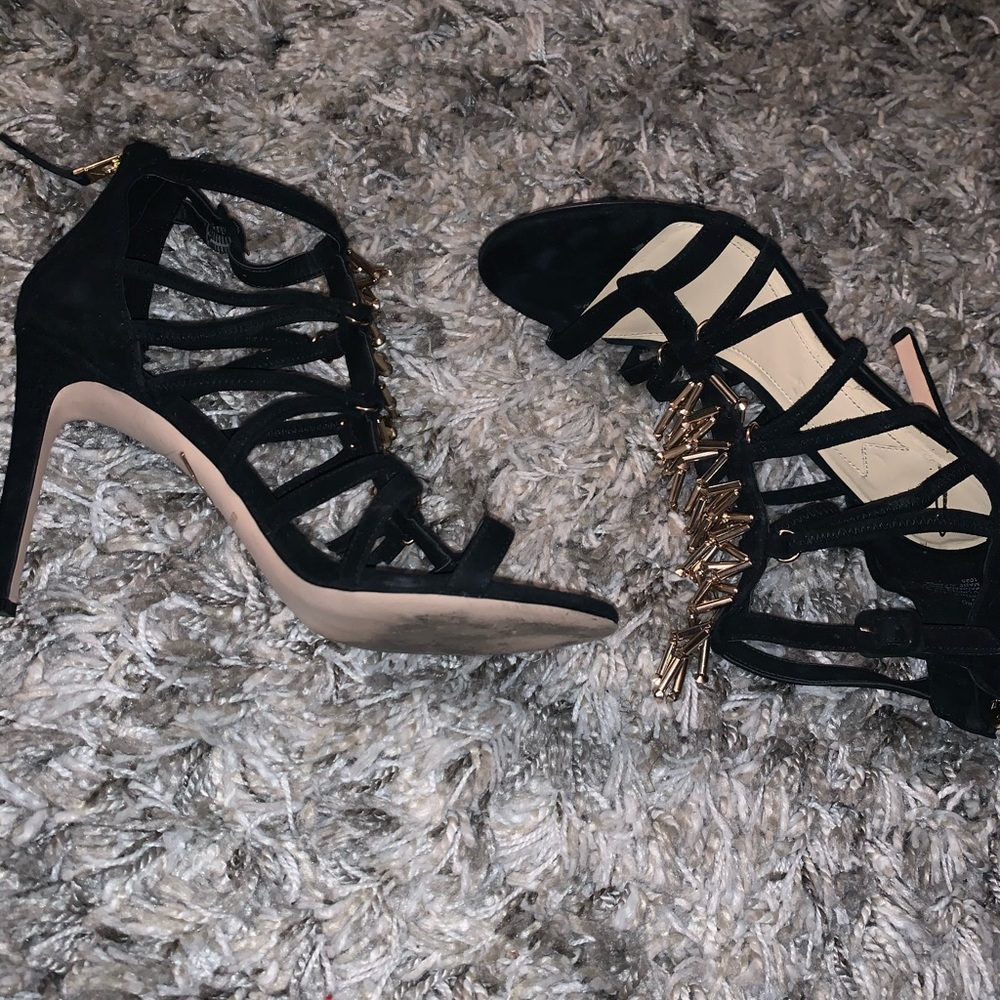 Black gold bullet strappy heels